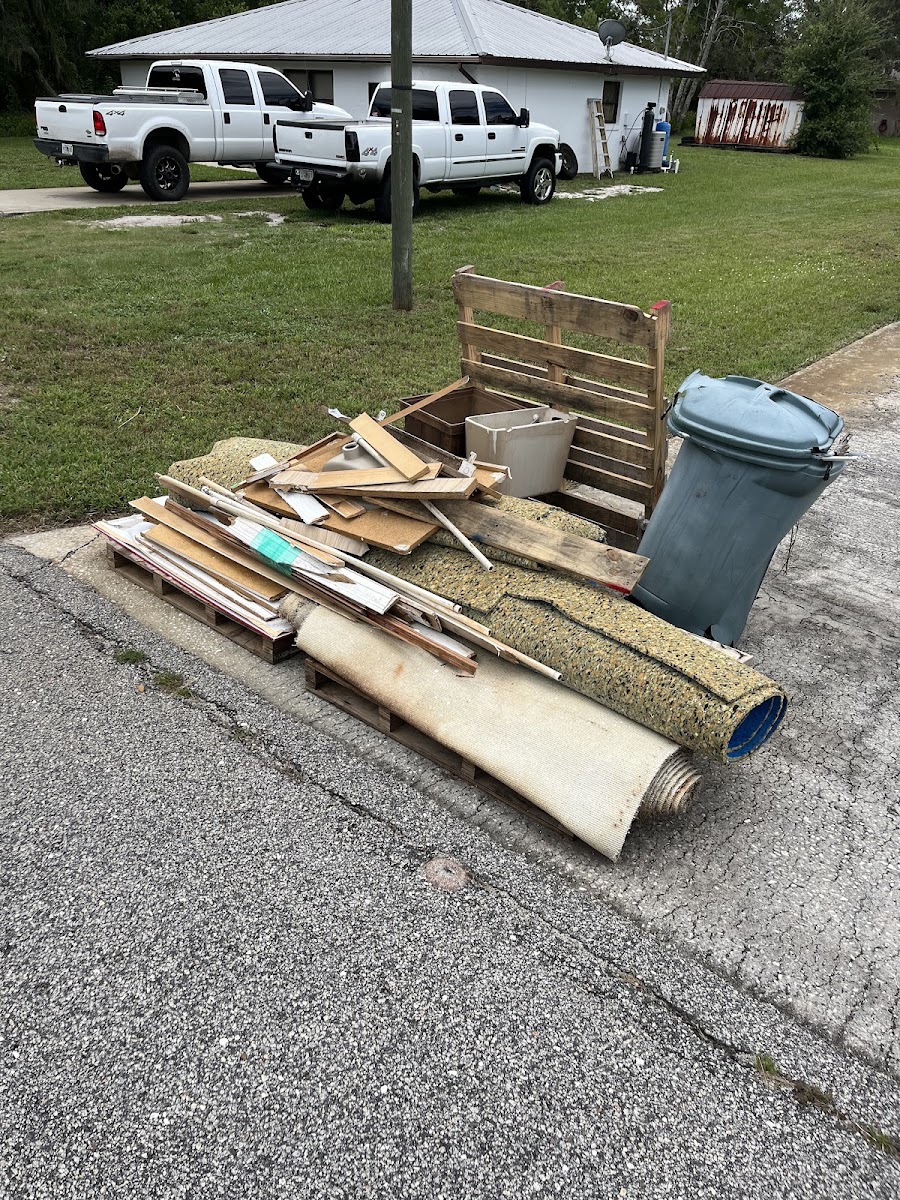 Debris loaded and strapped for haul-away