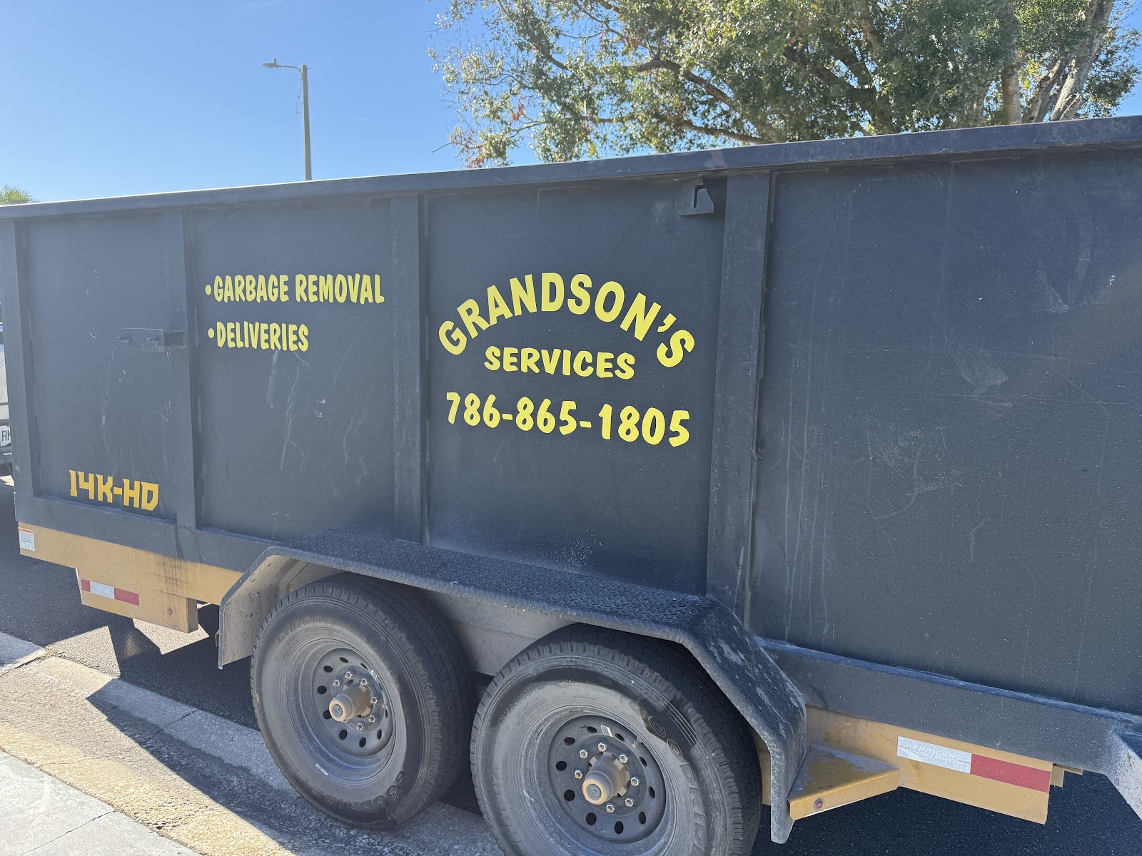 Loaded dump trailer on a Florida job site